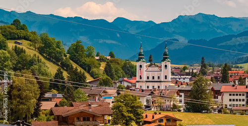 Alpine summer view with a church at Brixen im Thale, Kitzbuehel, Tyrol, Austria photo