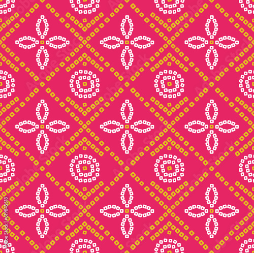 rani colour bandhani pattern with yellow and white dots