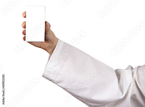 Doctor's hand wearing lab coat holding a clear medication mock up box or carton on white background