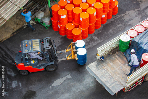 Top view oil barrels forklift truck move for on the transportation
