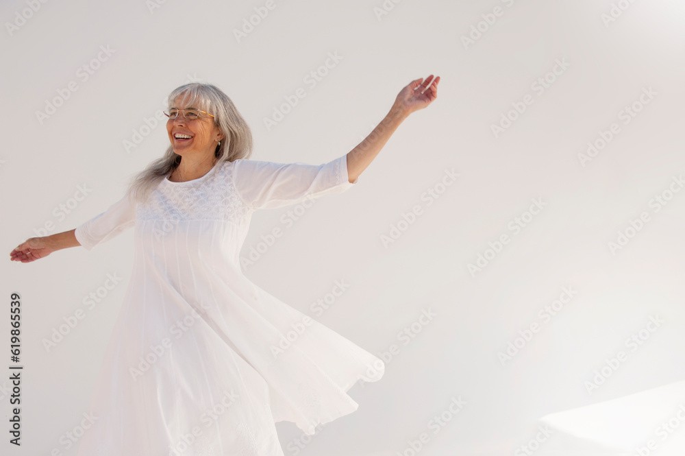 Naklejka premium Holistic Senior Woman. Photography on a white background.