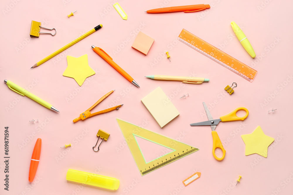 Composition with stationery supplies on pink background Composition with stationery supplies on pink background