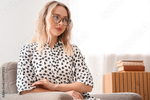 Young woman in stylish eyeg...