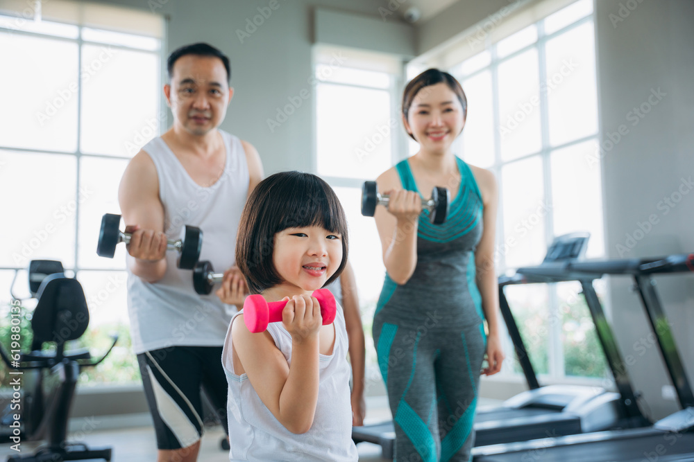 Workout Routine with a Happy and Active Family. Enhancing Fitness and Wellness. Fitness Exercise concept.