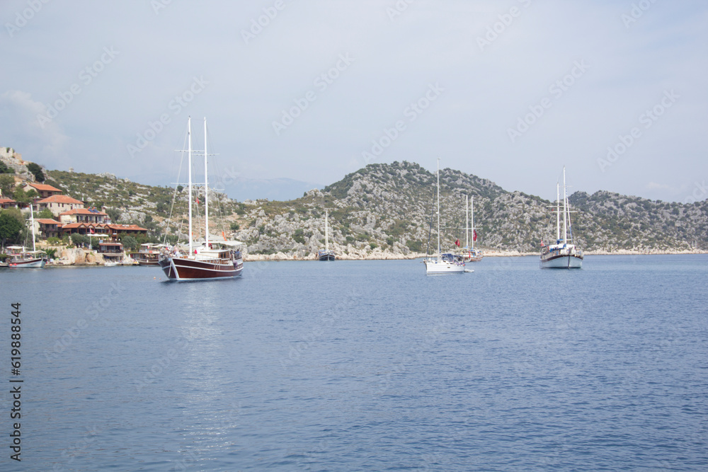 Beautiful view of the sea bay and pleasure yachts on a sunny summer day, in Turkey