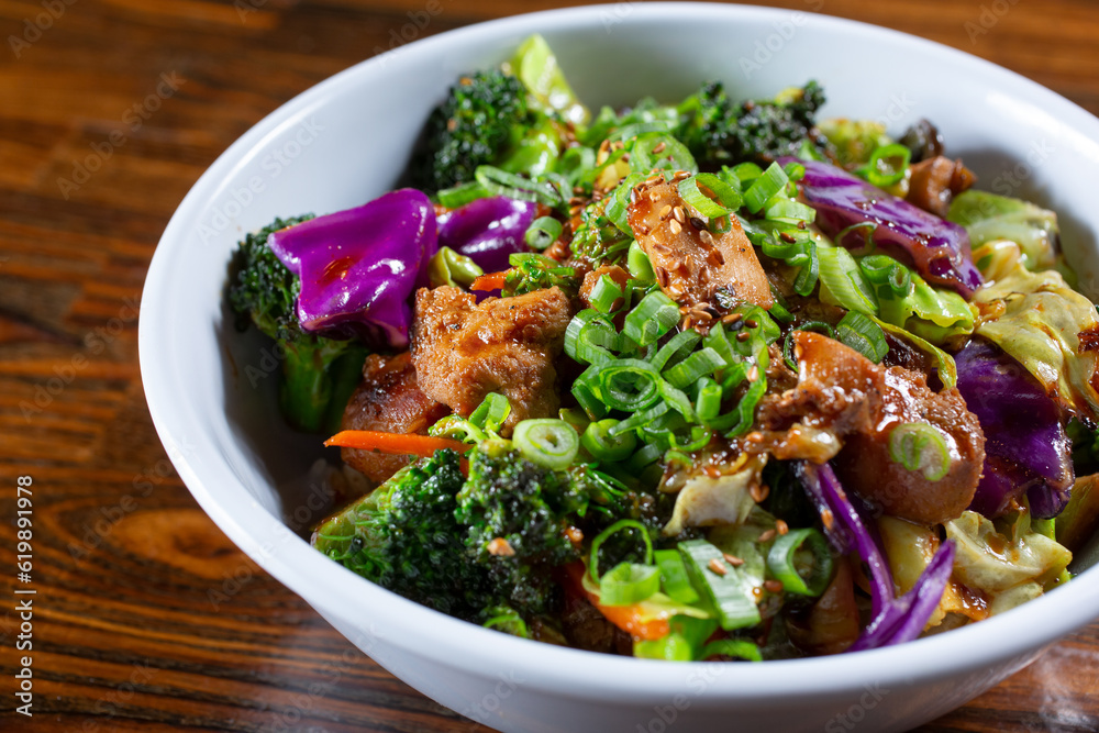 A view of a teriyaki chicken bowl. A view of a teriyaki chicken bowl.