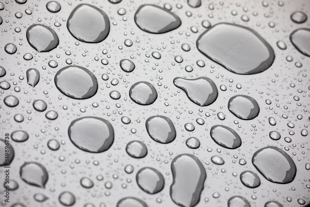 Water droplets on shiny surface