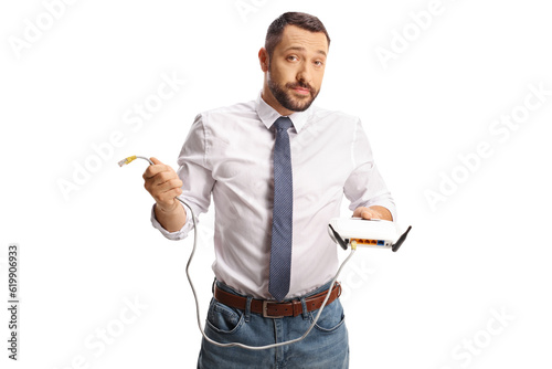 Bored young man holding a router