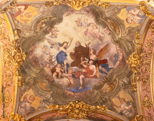 GENOVA, ITALY - MARCH 5, 2023: The fresco Apotheosis of Francis of Paola in church Chiesa di Santa Maria Maddalena by Giovanni Battista Casone from 18. cent.