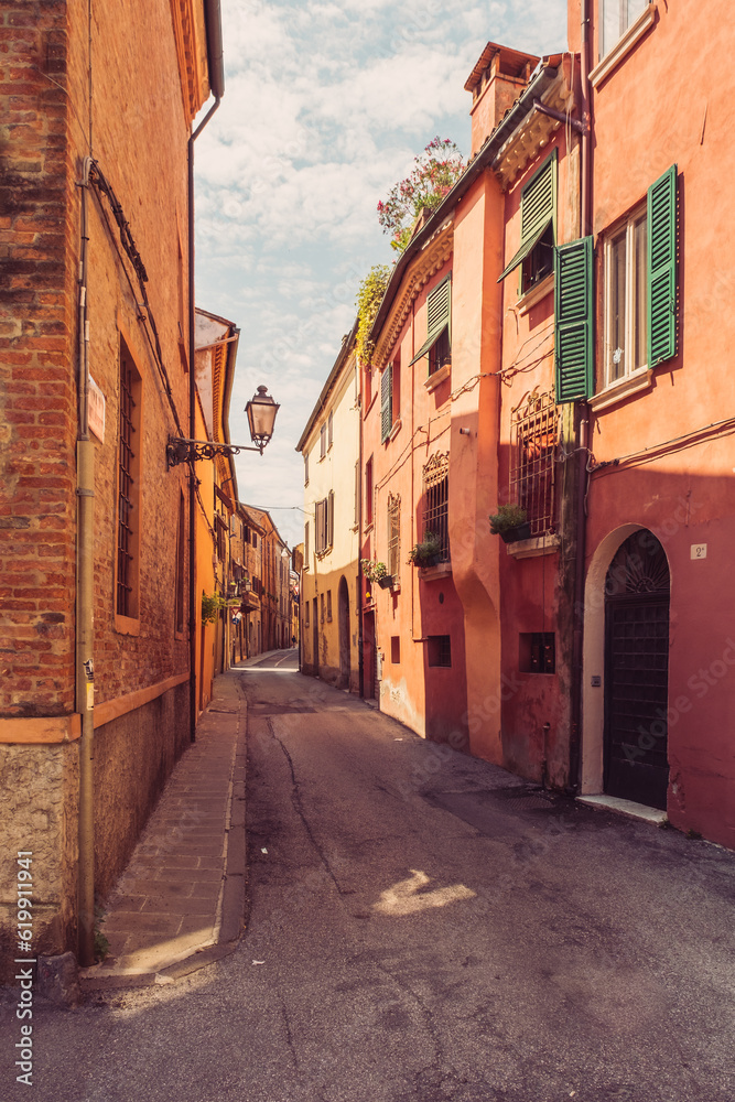 Cozy narrow street in Ferrara, Emilia-Romagna, Italy.