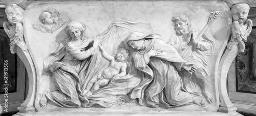 GENOVA, ITALY - MARCH 5, 2023: The marble relief of Nativity with the St. Therese in the church Chiesa di Santa Maria Maddalena by Tommaso Orsolino ( 1587 – 1675). photo