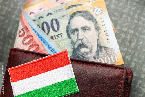 Hungarian money, forints, sticking out of a wallet, financial and economic concept, national symbol of hungary photo