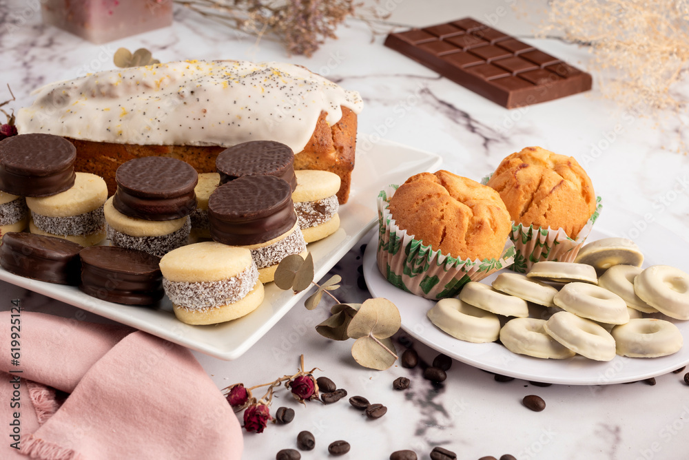 breakfast and snack with tea and coffee with cornstarch and chocolate alfajores with mini donuts and muffins breakfast and snack with tea and coffee with cornstarch and chocolate alfajores with mini donuts and muffins