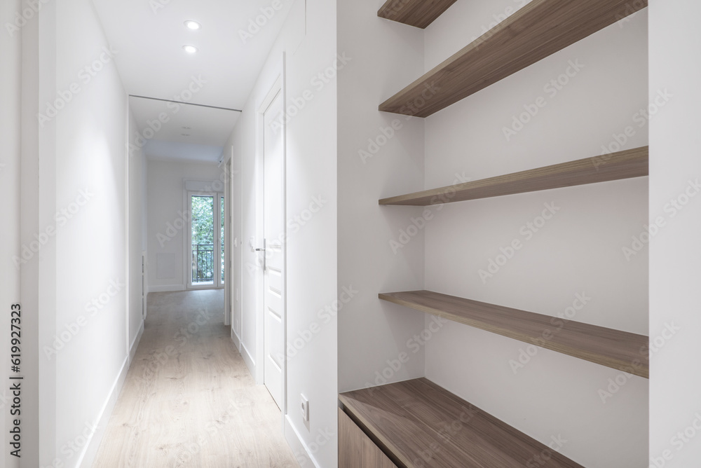A distribution corridor of a house with access to other rooms A distribution corridor of a house with access to other rooms