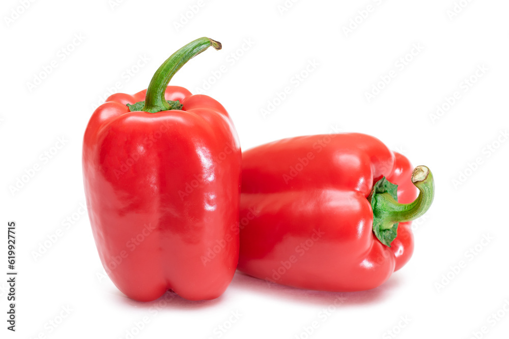 Two Fresh Red Sweet Bell Peppers Isolated on White Background Two Fresh Red Sweet Bell Peppers Isolated on White Background
