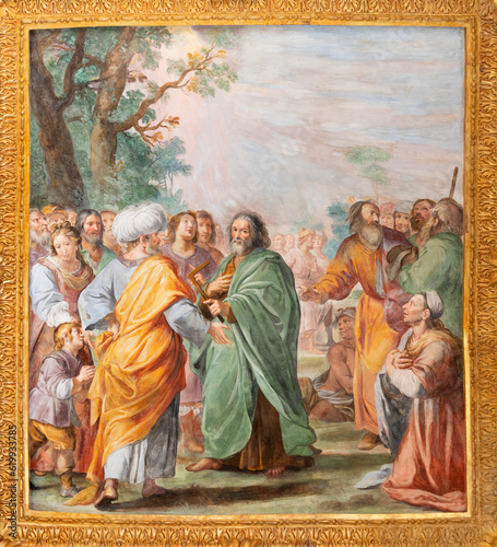 GENOVA, ITALY - MARCH 6, 2023: The fresco scene from life of St. Thomas the Apostle of in the church Basilica della Santissima Annunziata del Vastato by Gioacchino Assereto (1600 – 1649).
