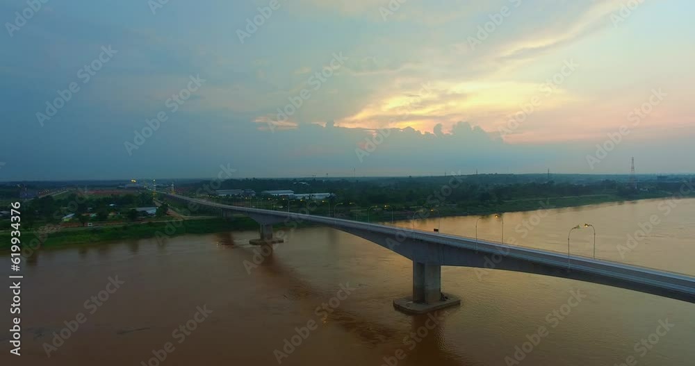 .aerial view beautiful Thai-Laos Friendship Bridge 3 across Kong river at sunrise..A beautiful bridge that connects Thailand on the Nakhon Phanom Province side and Laos Khammouane.. .aerial view beautiful Thai-Laos Friendship Bridge 3 across Kong river at sunrise..A beautiful bridge that connects Thailand on the Nakhon Phanom Province side and Laos Khammouane..