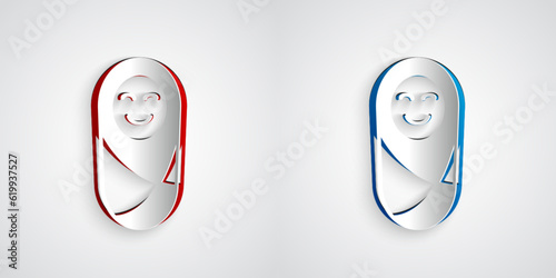 Paper cut Newborn baby infant swaddled or swaddling icon isolated on grey background. Baby kid child wrapped in blanket clothes. Paper art style. Vector
