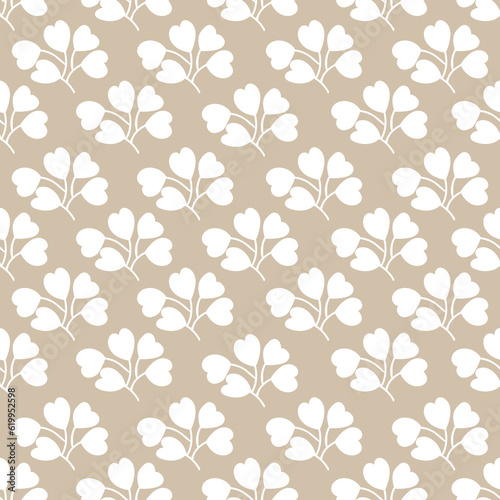 seamless repeat pattern with simple floral motifs on a beige background perfect for fabric, scrap booking, wallpaper, gift wrap projects