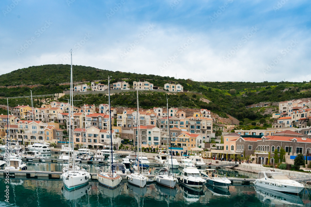 Marina and buildings along the Mediterranean promenade in Boko Kotor Bay