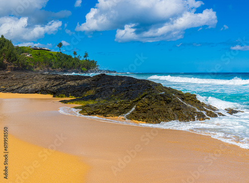 Waves Crash Over Exposed Lava Reef, Kauapea Beach, Kauai, Hawaii, USA photo