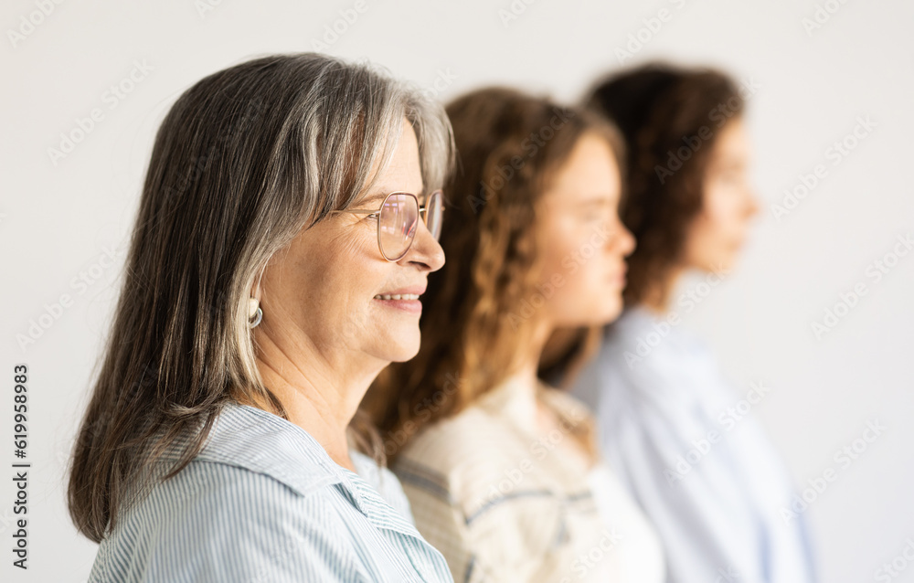 Cheerful european senior, mature and teen women and girl profile Cheerful european senior, mature and teen women and girl profile