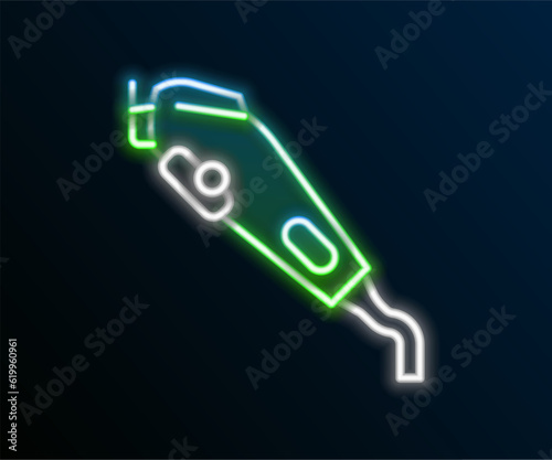 Glowing neon line Electrical hair clipper or shaver icon isolated on black background. Barbershop symbol. Colorful outline concept. Vector