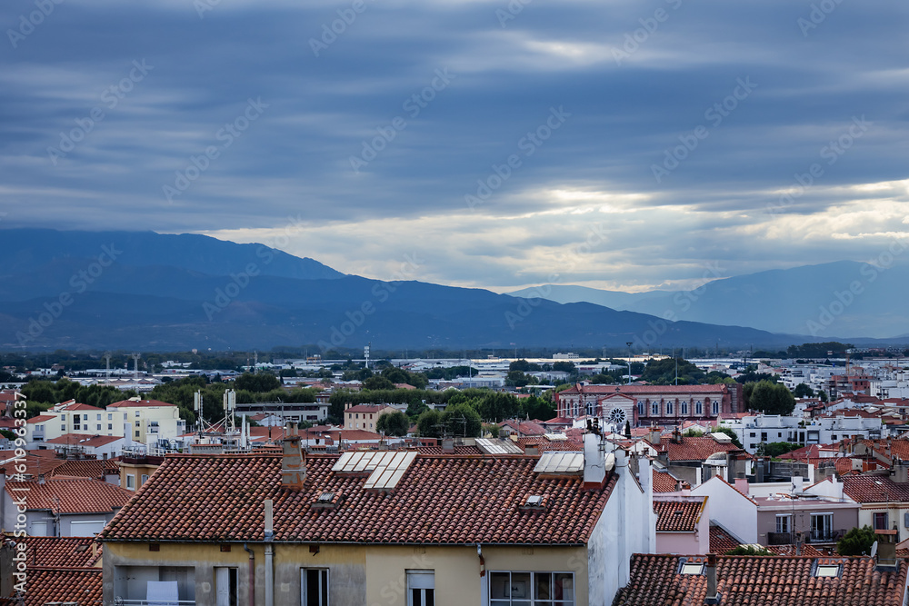 Red roofs of medieval French town Perpignan. Perpignan, Pyrenees-Orientales, France.