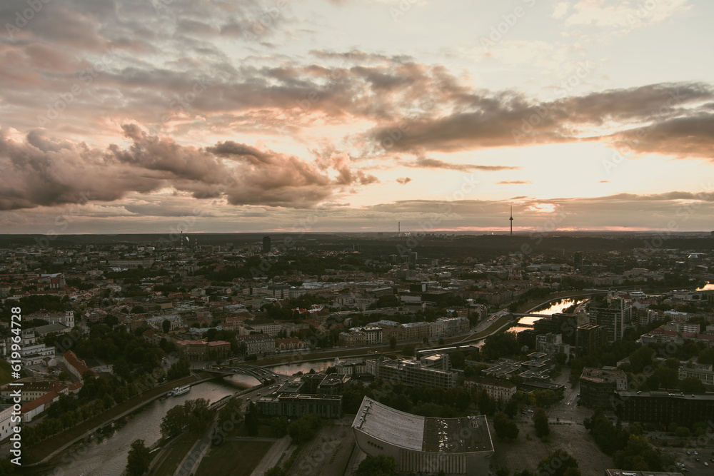 Beautiful aerial landscape of Neris river winding through Vilnius city.