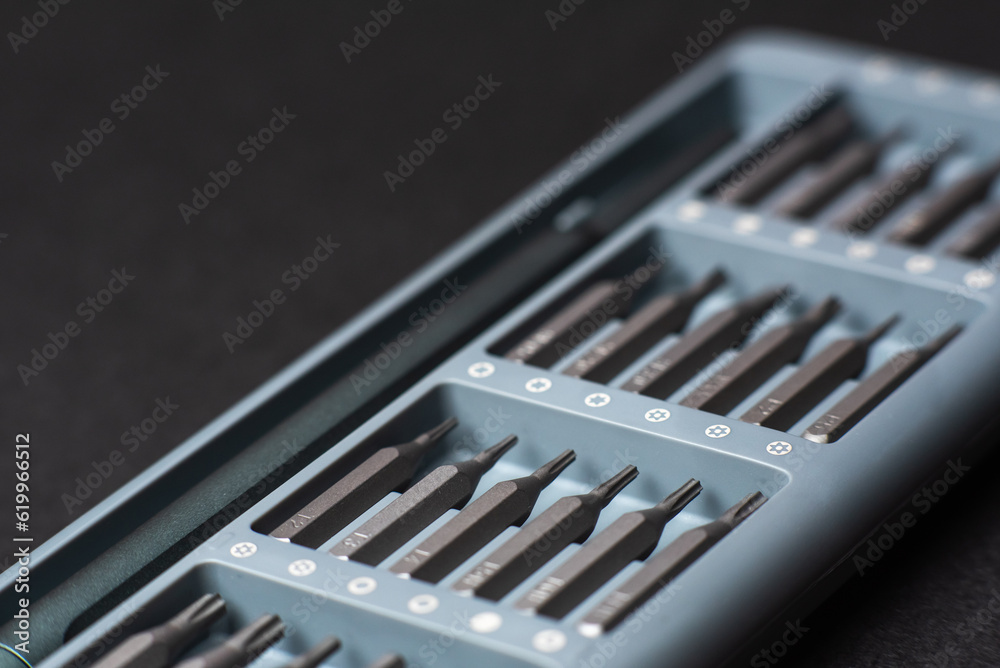 set of metal mini screwdrivers close-up set of metal mini screwdrivers close-up