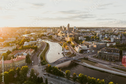 Beautiful aerial landscape of Neris river winding through Vilnius city. photo