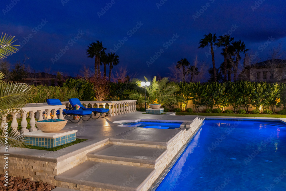 High-end custom outdoor swimming pool design and backyard construction & development photography.