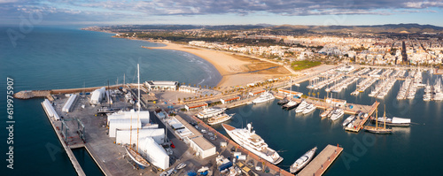 Billede på lærred View from drone of Vilanova i la Geltru beach and fishing port with boats at Cat