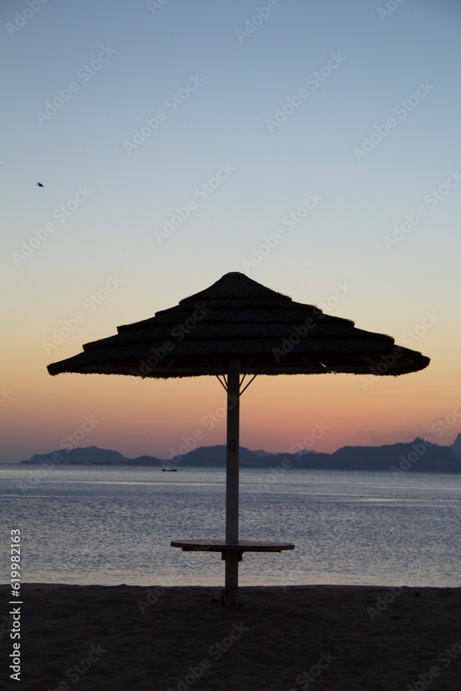 Beautiful view of the umbrella on a tropical beach Beautiful view of the umbrella on a tropical beach