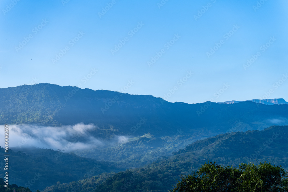 Mystical Mist: Enchanting Mountains veiled in Fog