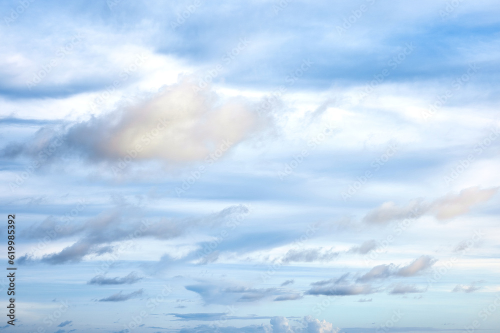 Fototapeta premium Beautiful clouds sunset light on blue sky with pink hues in asia on Bali island