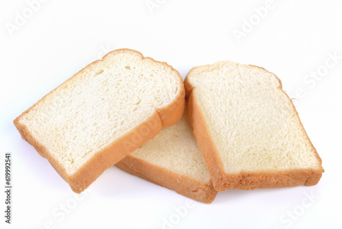 Piece of white bread on white background