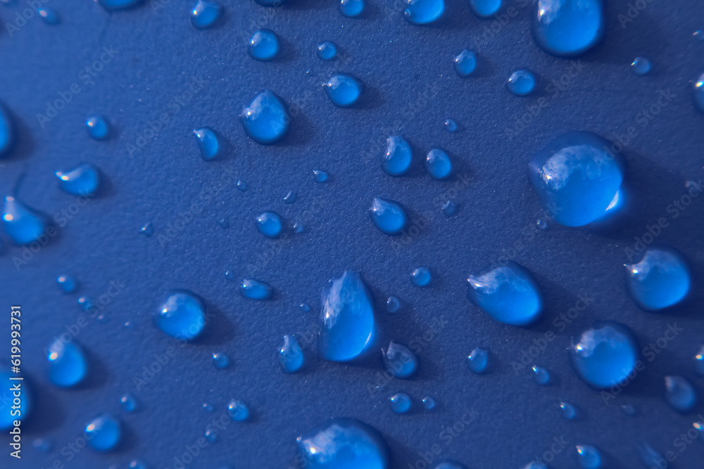 drops of water on a blue background 