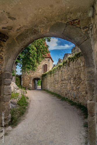View of the outer gate tower and connecting wall from the second gate arch in Zvikov medieval castle 