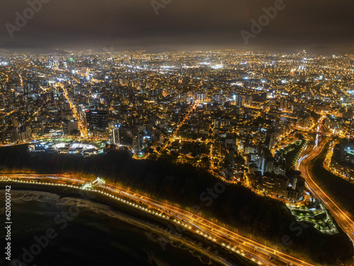 Drone panorama of the megacity lima skyline by night in peru