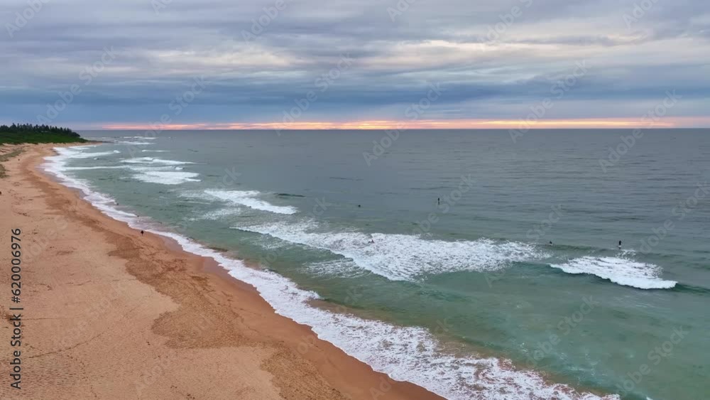 Sunrise seascape with cloud covered sky at Shelly Beach on the Central Coast, NSW, Australia. Sunrise seascape with cloud covered sky at Shelly Beach on the Central Coast, NSW, Australia.