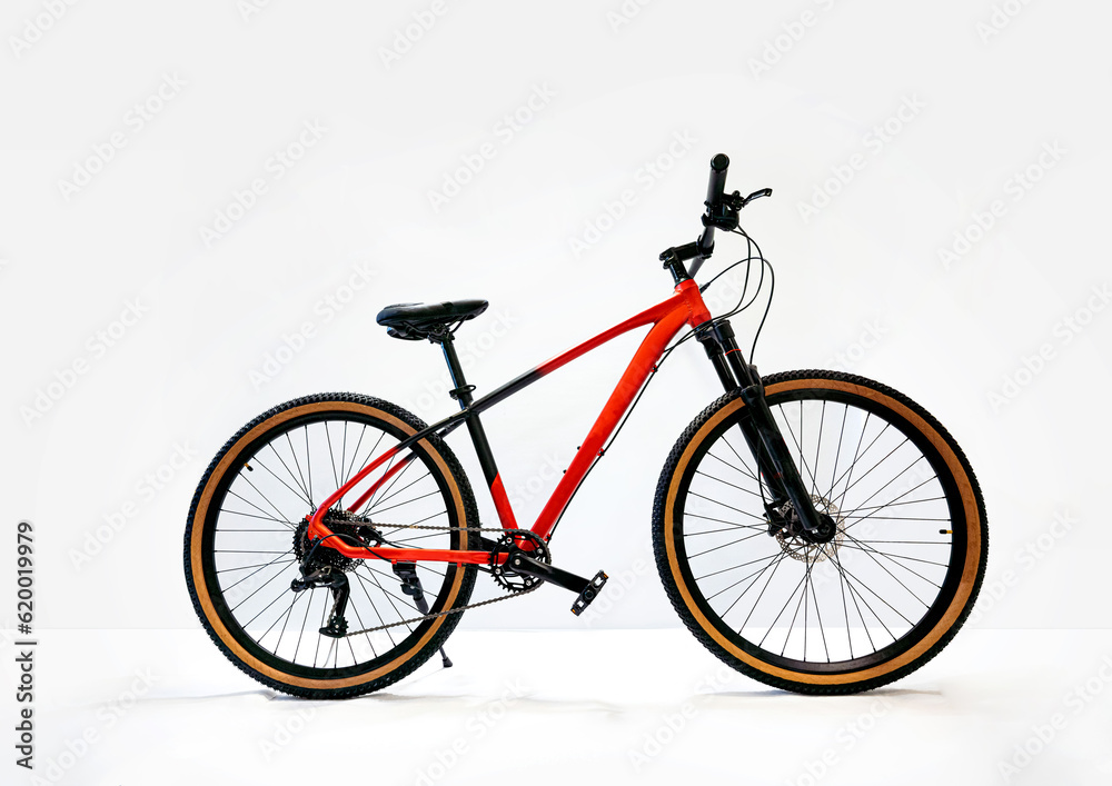 Fototapeta premium Red mountain bike isolated on white background. High quality photo