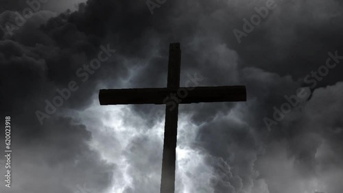 wooden cross amidst storm clouds background.