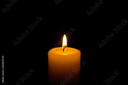 Candle flame against a black background