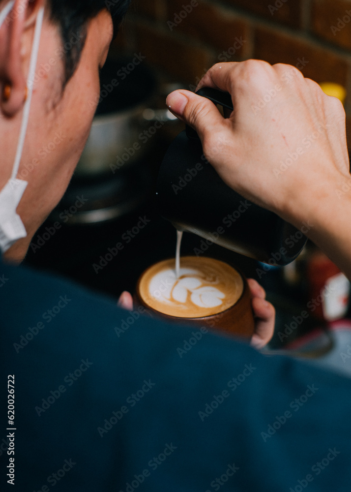 barista making coffee process latte art
