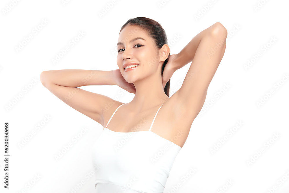 Beautiful Young Asian woman lifting hands up to show off clean and hygienic armpits or underarms on white background, Smooth armpit cleanliness and protection concept Beautiful Young Asian woman lifting hands up to show off clean and hygienic armpits or underarms on white background, Smooth armpit cleanliness and protection concept