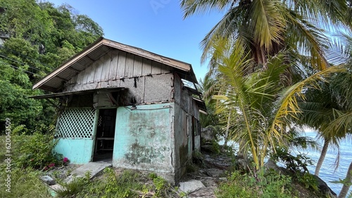 an old abandoned hut hangs on the edge of a ravine, at Samadua, South Aceh Indonesia 