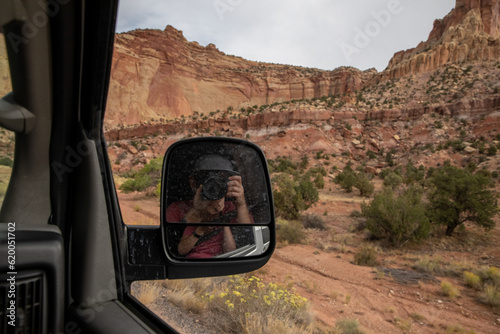 Photographer in side mirror photographing Capital Reef National Park photo