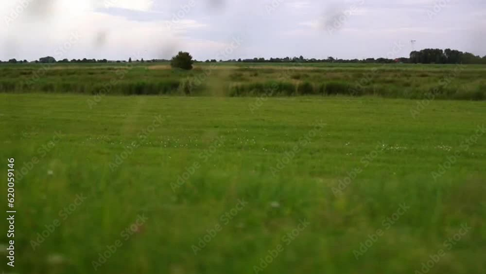straight flat landscape without people and houses in northern germany straight flat landscape without people and houses in northern germany