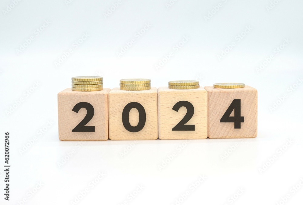 2024 written on wooden cubes with coins on white background.
inflation concept, annual business, the year's economy 2024 written on wooden cubes with coins on white background.
inflation concept, annual business, the year's economy